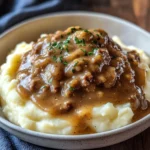 Delicious chicken chicken hamburger Gravy Over Mashed Potatoes